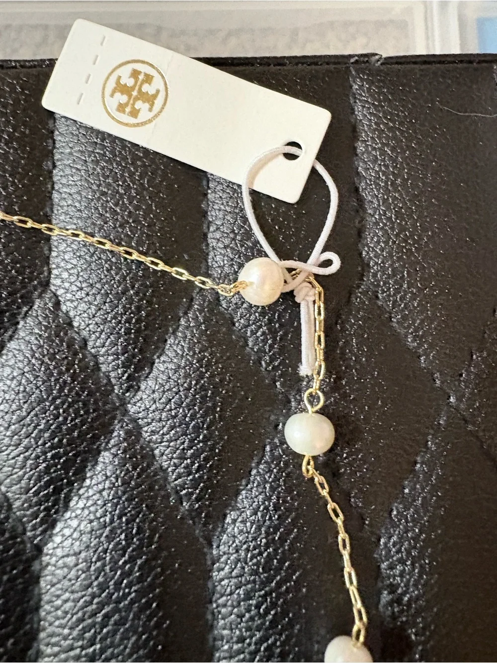 Tory Burch Gold Logo Station Necklace with White Beads
